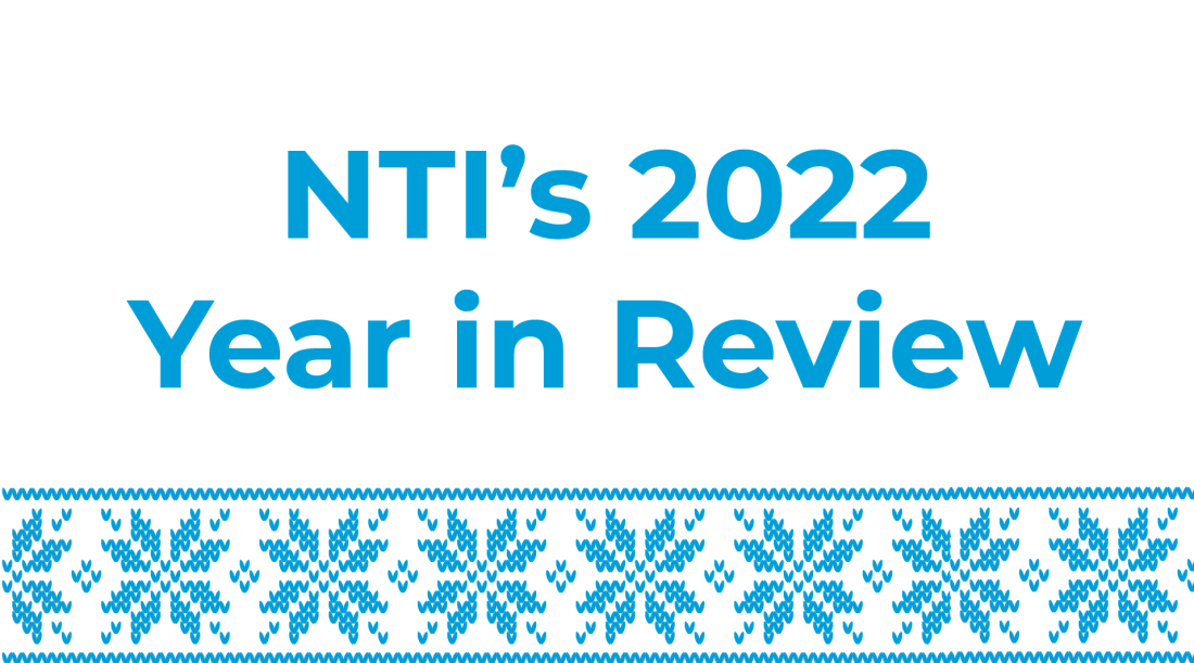 White background with blue snowflakes in an ugly sweater pattern with the blue text "NTI's 2022 Year in Review"